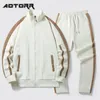 Mens Tracksuits Outono Moda Listrado Homens Tracksuit Set Manga Longa Jaqueta Sweatpants Solto Casual Esporte Terno Harajuku Sportswear 231129