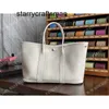 Sac de jardin en cuir véritable portable femme 30 cm Milk Shake peau de vache blanche L avec logo