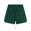 Rhude Designer Shorts Męskie modne spodnie plażowe Sports Fitness Luksusowy wysokiej jakości swobodny wszechstronny szybki suszący oddychanie Europejski S-XL F5FQ F5FQ