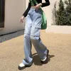 Jeans feminino Hong Kong Design original de tendência Hip Hop Avant-Garde Calças de carga multicotela