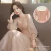 Evening Dresses Long Sleeved Evening Dresses for Women in 2023 Banquet Art Exam Champagne Color Light Luxury Niche High-end Host with a Sense of Luxury