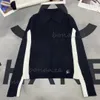 Women's New Spring and Autumn Black and White Color Blocking Slim Flip Collar Bottom Pullover Sweater