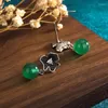 Studörhängen design retro kinesisk stil elektropläterad thailändsk silverfärg för kvinnor inlagd imitation jade plommonblomma