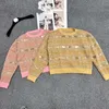 Suéteres femininos designer francês jacquard em torno do pescoço pulôver camisola de malha para 2023 outono novo estilo casual versátil topo dvmf