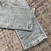 Män s jeans män smala sträcka rippade knä tvättade blå 231129