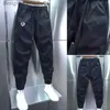 Męskie spodnie męskie odzież jesienna swobodne spodnie sportowe 2023 Popularne nowe wszechstronne trend mody marki marka Casual Pants L231129