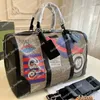 Nieuwe Mannen Plunjezak Vrouwen Reistassen Luxe Mode Handtas Designer Bagage Canvans Cartoon CrossBody Tassen Totes Luchthaventas 45cm