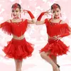 Vêtements de scène Spandex adulte enfant Costumes de danse latine gland haut sans manches jupe 2 pièces filles ensemble pour