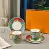 Set regalo con tazze e piattini di design, fiori primaverili, motivi di piante, piattino stampato, tazze da caffè, set regalo con scatola
