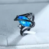 Anello femminile in pietra opale blu dallo stile unico Fedi nuziali vintage in oro nero per le donne Anello di fidanzamento con promessa di amore208l