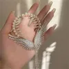 Angel Wings Hair Hair Clips Women Girls Rhinestone شرابة بونيل ذيل بونز بزر الشعر الإكسسوارات الذهبية للأزياء GC2482