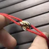 Catena Bracciale portafortuna a tre colori di alta qualità con tre anelli. La dimensione può essere regolata arbitrariamente. Viene fornito con un braccialetto per la coppia con sacchetto per la polvere 231129.