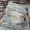 Мужские джинсы мужские узкие эластичные рваные до колена синие 231129
