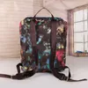 2023 Diseñador Negro Estampado Mochilas Bolsos Hombres Mujeres PU Mochila de cuero Mochila escolar Moda Mochila Mochila Mochila Presbicia Bolsas de hombro