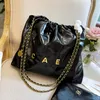 10a Kvinna Designerväska Glänsande läder Bucket Bag Luxury Houlder Påsar Kvinnor Väskor Handväska Kalvskinn quiltad Tote Black Purse Womens Shoulder CC Purse Chain Bag