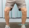 Yoga Outfit Mens Shorts avec poches latérales Super Qualité Sports Hommes Beach Joggers Loisirs Stretch Casual Taille M-XXL Drop Livraison