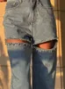 Damesjeans TWOTWINSTYLE Geborduurde flares voor dames Hoge taille Patchwork Knop Uithollen Zomer Wijde pijpen Broek Vrouwelijke mode 231129