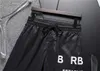 Short de créateur pour hommes couleur rayée à carreaux noir et blanc style de luxe européen et américain marque de couture pur coton anti-rides respirant plage à séchage rapide 3XL