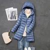 Femmes vers le bas Parkas femmes Ultra léger pliable longue doudoune automne hiver chapeau chaud détachable à capuche femme manteau Parka 5XL 7XL 231129