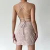 Günlük elbiseler kadınlar kayma elbise yaz boho plaj çiçek baskı spagetti kayışları düşük kesilmiş bandaj sırtsız mini vestidos seksi giyim