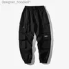 Calças masculinas streetwear preto masculino harem joggers calças calças de carga 2023 hip hop casual bolsos sweatpants oversized moda calças l231129