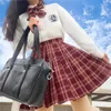 Kläder sätter japansk koreansk skolkjol för flickor Sailor Uniform Women High midje veckad Lady Summer Slim Harajuku kjolar