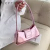 Sacos de noite Pequeno ombro rosa para mulheres 2023 Primavera Designer Prata Moda Bolsas Tendência Couro Underarm Senhoras Cor Sólida Ouro 231128