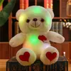 Bambole di peluche 1 pz giocattoli per bambini orso di luce giocattolo strumento regalo morbido regalo di compleanno LED animali di peluche colorati luminosi 231128