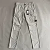 Le plus récent vêtement teint CP Cargo pantalon une poche d'objectif pantalon de luxe en plein air hommes pantalons tactiques en vrac nouveau concepteur survêtement