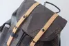 2023 Backpackbackpack Cowhide Döşeme ve Liningtop Deri Kollu Flep Açılış ve Kapatma Bağlantısı ve Drawstring Açma ve Kapanış Tarafı ile Metal Parçalar