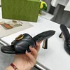 Pantofole firmate con tacco medio classiche estive pigre designer moda lettera in metallo infradito in pelle da donna sandali formali sexy grandi