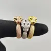 Anneaux de mariage Européen et américain haut de gamme plein diamant tête de léopard anneau 925 argent plaqué neutre marque de mode bijoux cadeau 231129