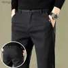 Męskie spodnie 2023 Autumn Nowe męskie spodnie Slim Business Office Elastyczna talia gruba czarna szara brązowa klasyczne spodnie spodni L231129