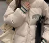 Opieki odzieżowe damskie 2023 Zimowa nowa edycja koreańska luźna haftowany płaszcz dla chleba studenckiego bawełniany płaszcz damski zagęszczony ciepły płaszcz modny