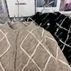 Kvinnors tröjor faller vinter 2023 Ny Balsamic skiddiamantstickad Cardigan Vintage Camel Black Sweater Short Coat Women Sweaters Men Designer