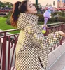 Manteaux d'extérieur pour femmes Veste en duvet de coton à damier courte pour femme 2023 nouvelle version coréenne d'hiver veste en coton ample et amincissante veste en coton à capuche