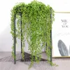 장식용 꽃 녹색 인공 잔디 식물 벽 벽 배경 플라스틱 포도 나무 야외 정원 홈 배경 장식이 등나무 가짜 매달려