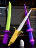 Jeux de nouveauté 3D Gravity Katanas Épée Forme de banane Épées rétractables Décompression Katana Soulagement du stress Jouet Couteau Enfants Cadeaux de Noël 231130 Meilleure qualité