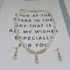 Set di gioielli con collana di orecchini di perle di moda di lusso per accessori per ali da donna regalo per feste di banchetto