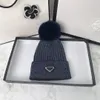 Designer de malha senhoras gorro chapéus inverno ao ar livre quente moda gorro unisex queda de lã boné marca carta bonés