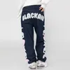 Мужские джинсы Рваные джинсы с вышивкой «Череп и пять звезд» Мужские брюки Harajuku Vibe Style Уличная одежда Большие повседневные джинсовые брюки 231129