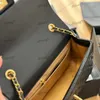 Woc Moda Donna Borsa a tracolla in pelle con diamanti Oro Hardware Fibbia in metallo Borsa di lusso con stampa Palla dorata Borsa a tracolla con catena Matelasse Borse per trucco Borsa 17/20 cm