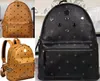 Moda clássica versão coreana de mochila de rebite punk mochila escolar masculina e feminina mochila de viagem mochila masculina mochila de volta