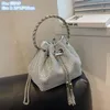 Whole factory ladies shoulder bags sweet and lovely tassel bucket bag elegant solid color leather mobile phone coin purse stre252j