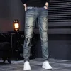 Jeans pour hommes 2023 Marque de mode Broderie Zipper Panneau de bord déchiqueté Rétro Portant la corde Version coréenne Demin