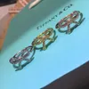 Bandringe, blaue Box, klassischer Designer-TF-Ring oben, neuer Seiko-Bogenring für Damen mit einzigartigem Design, hochwertig, elegant und modisch, personalisierter leichter Luxus-Index