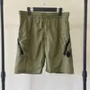 Sommar rak nylon lös avslappnad snabbtorkande CP-shorts byxor utomhus Spodenki Meskie Men's Beach Sports 5Color Thin Pants Shorts Shorts