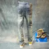 Jeans da uomo stile italiano moda uomo pantaloni di jeans casual di design vintage strappati slim fit retrò blu elasticizzati di alta qualità