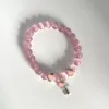 Bracciale con perline occhio di gatto, design retrò di nicchia, gioielli con croce ad alto senso, ornamenti a mano