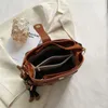 Kvällspåsar säljer vintage enkel liten pu läder hink crossbody väska för kvinnor 2023 designer mode lady lyx svart axel handväska 231129